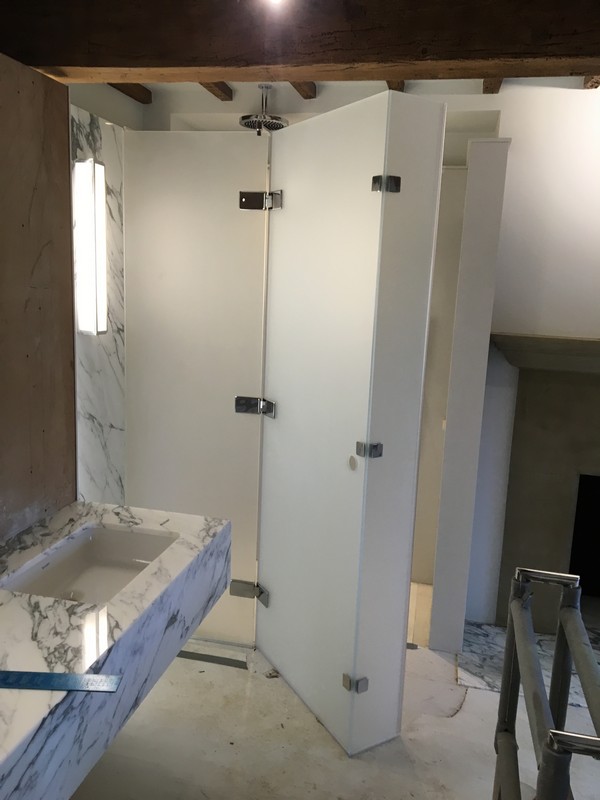 Bespoke frosted glass shower enclosure in Elephant & Castle luxury bathroom