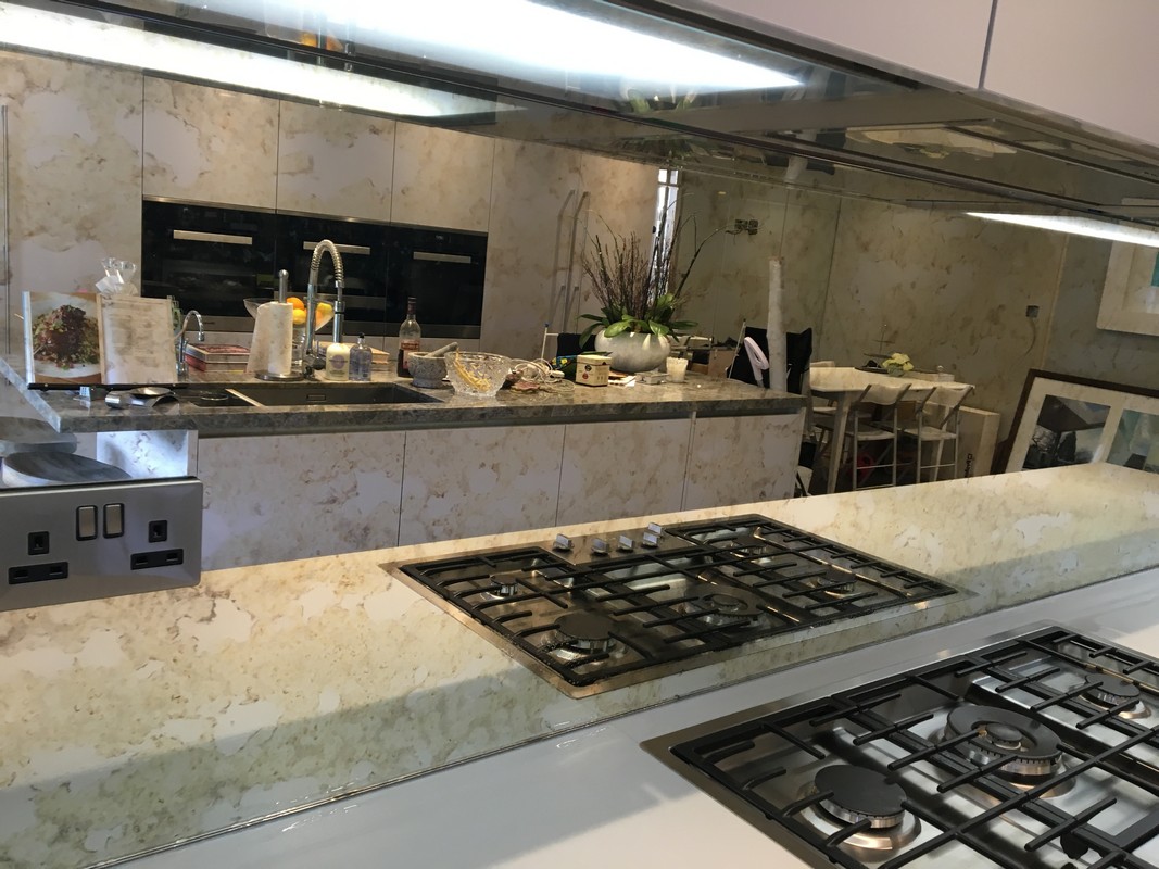 Mirror glass splashback in Elephant & Castle luxury kitchen
